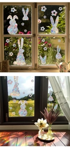 Rainbow prism window decals showing rabbit and flower designs with colorful suncatcher effect