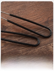 Detail of ergonomic stainless steel handle with non-slip black anti-scald coating grip