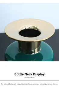 Detail view of the wide golden electroplated rim and green ceramic vase neck