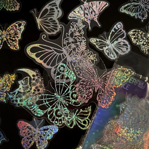 Set of 100 holographic butterfly PET stickers with colorful iridescent laser effects