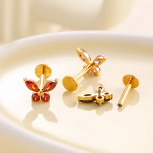 F136 titanium butterfly labret with colorful cubic zirconia studs from multiple angles
