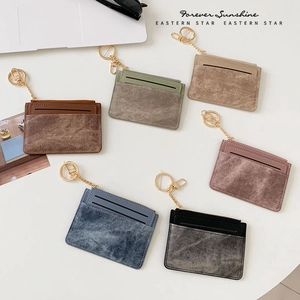 Set of 6 minimalist slim faux leather card holders with zippers and gold keychains
