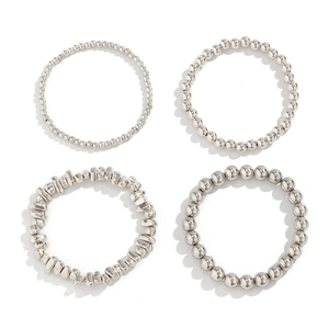 Detail of 4-piece silver metal beaded bracelet set with various size beads and stones
