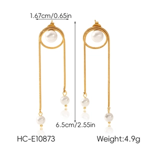Detail view of gold 18k plated drop earrings with pearls and snake chain dimensions