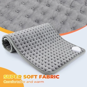 Macro detail of super soft grey flannel fabric and heating pad texture showing warm comfort