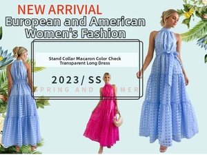 Detail of macaron blue and pink plaid maxi dress with high neck and waist tie belt