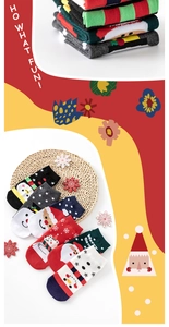 Close-up of assorted cotton Christmas socks featuring Santa Claus and snowman patterns