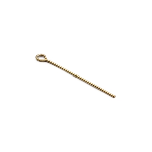 Golden stainless steel eye pin for DIY jewelry making with centered loop on white background