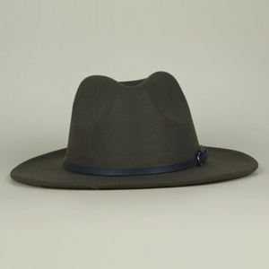 Detail of dark olive wool felt hat with a navy leather belt and silver metal buckle
