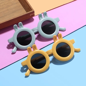 Kids round sunglasses with cute rabbit ears in yellow and blue colors