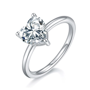 Elegant 2 carat heart-shaped moissanite ring in silver setting on white background