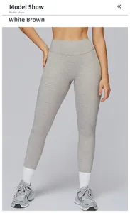 Close-up of high-waist white brown heathered yoga pants with knit texture and model styling