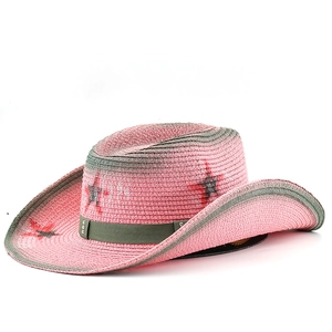 Pink straw cowboy hat with green brim and star prints for summer beach vacation