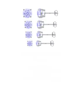 Macro detail of lavender S925 silver stud earrings set with four-prong faceted stones
