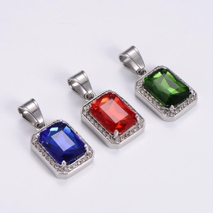 Detail of hip hop rectangle ruby sapphire and emerald pendants on silver chains