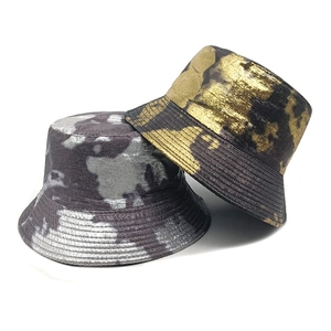 Dual-sided tie-dye bucket hats with metallic finish for sun protection and outdoor style