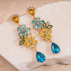 Vintage floral drop earrings with colorful rhinestones and pear-shaped blue pendant