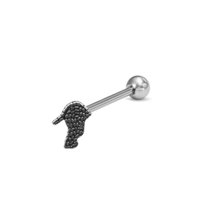 Macro view of silver skull tongue ring showing detailed metal texture and screw ball end
