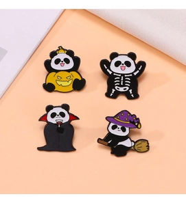 Detailed set of four Halloween panda enamel pins featuring pumpkin and wizard themes