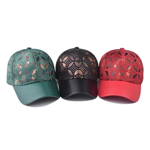 Thick checkered baseball cap with metallic geometric pattern in green, black, and red