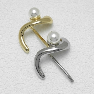 Minimalist gold and silver ponytail clips with elegant pearl accents on white background