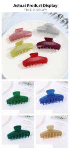 Detail view of large glitter hair claws in multiple colors for thick hair styling