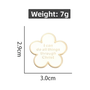 Detailed size view of a white flower enamel pin with inspirational quote and measurements