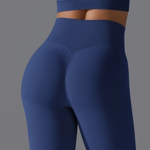 Detail view of seamless high-waist yoga leggings with scrunch butt lifting effect