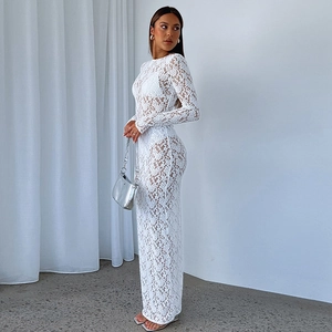 Side view of a slim-fit white lace maxi dress with see-through hollow floral patterns