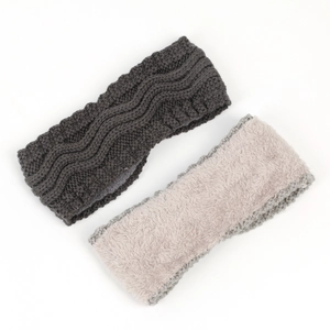 Close-up of winter knitted headband with fleece lining and soft wool texture detail