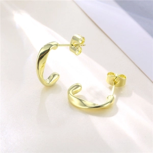 Elegant 18K gold-plated C-shaped twisted earrings with minimalist polished finish