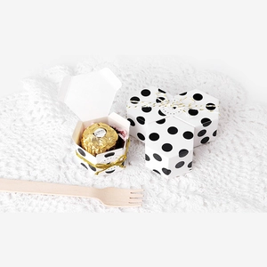 Mini hexagonal white gift boxes with black polka dots and rustic hemp rope ties