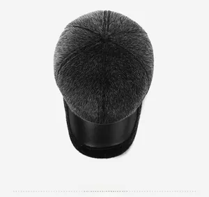 Top view of a winter baseball cap featuring thick dark gray faux fur and black visor