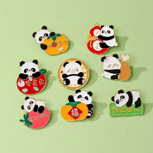 Cute panda enamel pin set with lucky symbols on a clean light green background
