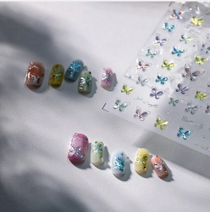 Macro shot of 3D laser butterfly nail decals M-503 with holographic gradient effect