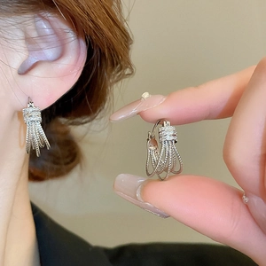 Silver fringe hoop earrings with pavé zircons and layered twisted metal rings