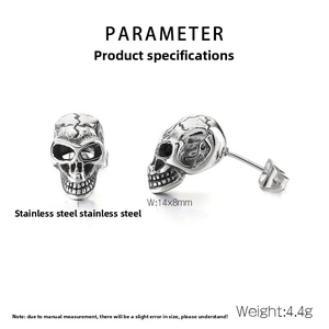Detail view of vintage silver punk skull stud earrings with size and weight specs