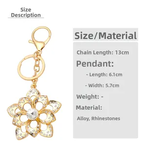 Detailed view of flower keychain dimensions with gold alloy and white rhinestones