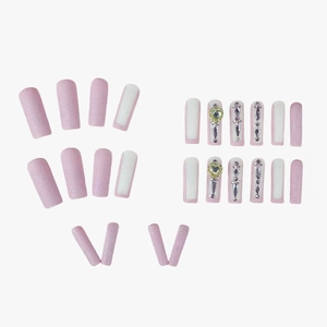 Pink heart press-on nails with glitter French tip and luxury rhinestone accents