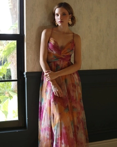 Detailed shot of deep V-neck mesh dress with artistic abstract floral print and thin straps