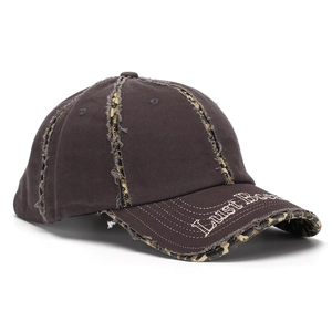 Close-up of vintage brown baseball cap with 3D embroidery and leopard print distressed edge