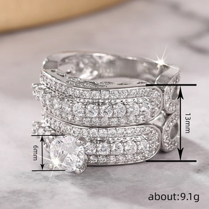 Elegant two-piece stacked wedding ring set with micro-pave cubic zirconia and 6mm center stone