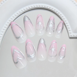 Pink and white ombre almond press-on nails with silver chrome Y2K star and heart designs