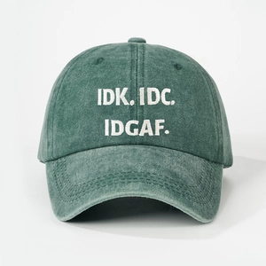 Dark green washed cotton baseball cap with IDK IDC IDGAF white embroidery text