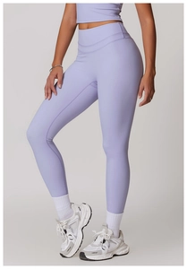 Detail view of high waist lilac yoga pants with moisture-wicking compression fabric