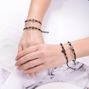 Adjustable woven couple bracelets with custom photo projection stones in black and silver