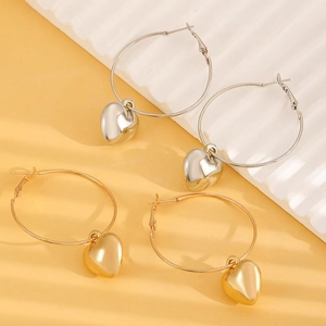 Chic 3D heart hoop earrings in gold and silver finish with high-polish mirror surface