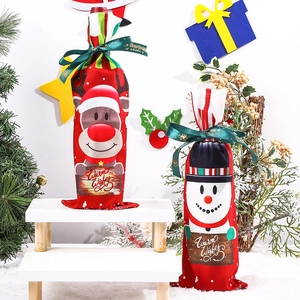 Christmas wine bottle covers featuring cartoon reindeer and snowman with Warm Wishes