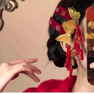 Elegant Chinese butterfly tassel hair clip with red velvet and gold metal elements