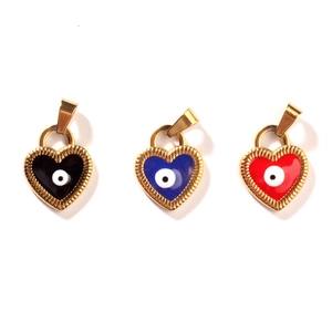 Golden heart pendants with colorful evil eye enamel in black, blue, and red on white background